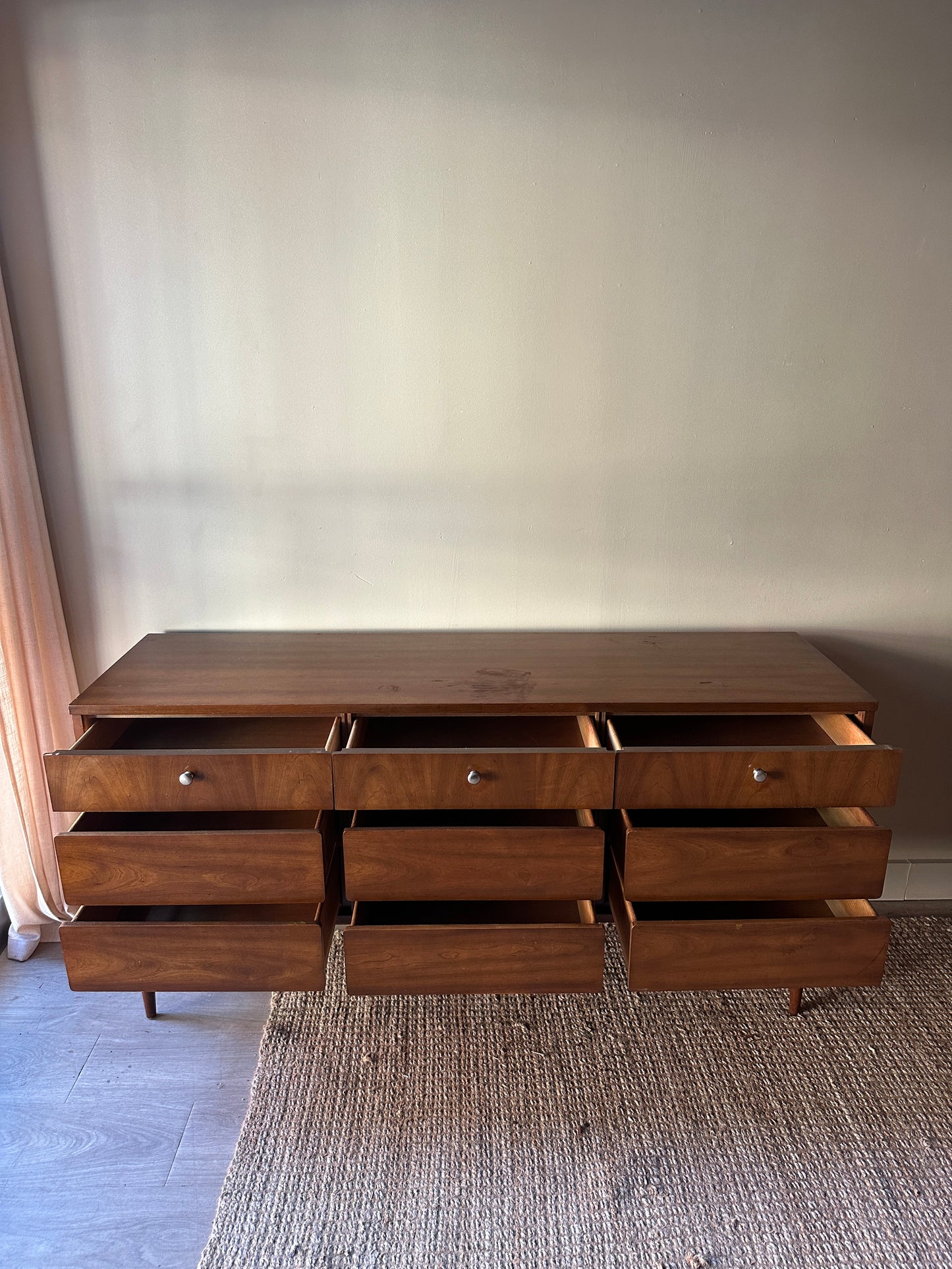 Walnut nine drawer, chrome knob dresser