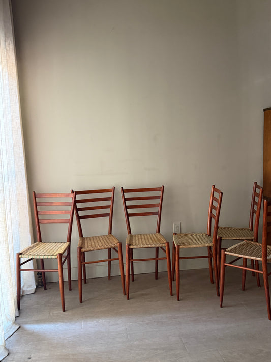 Chiavari Spinetto ladder back dining chairs with wicker cord seats. Sold as a set of 6.
