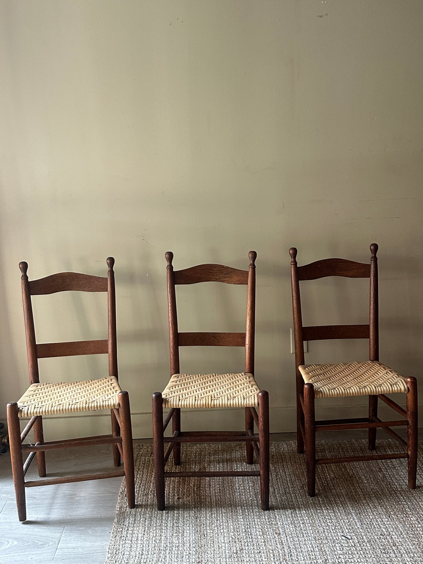 Woven seat chairs. Sold individually.