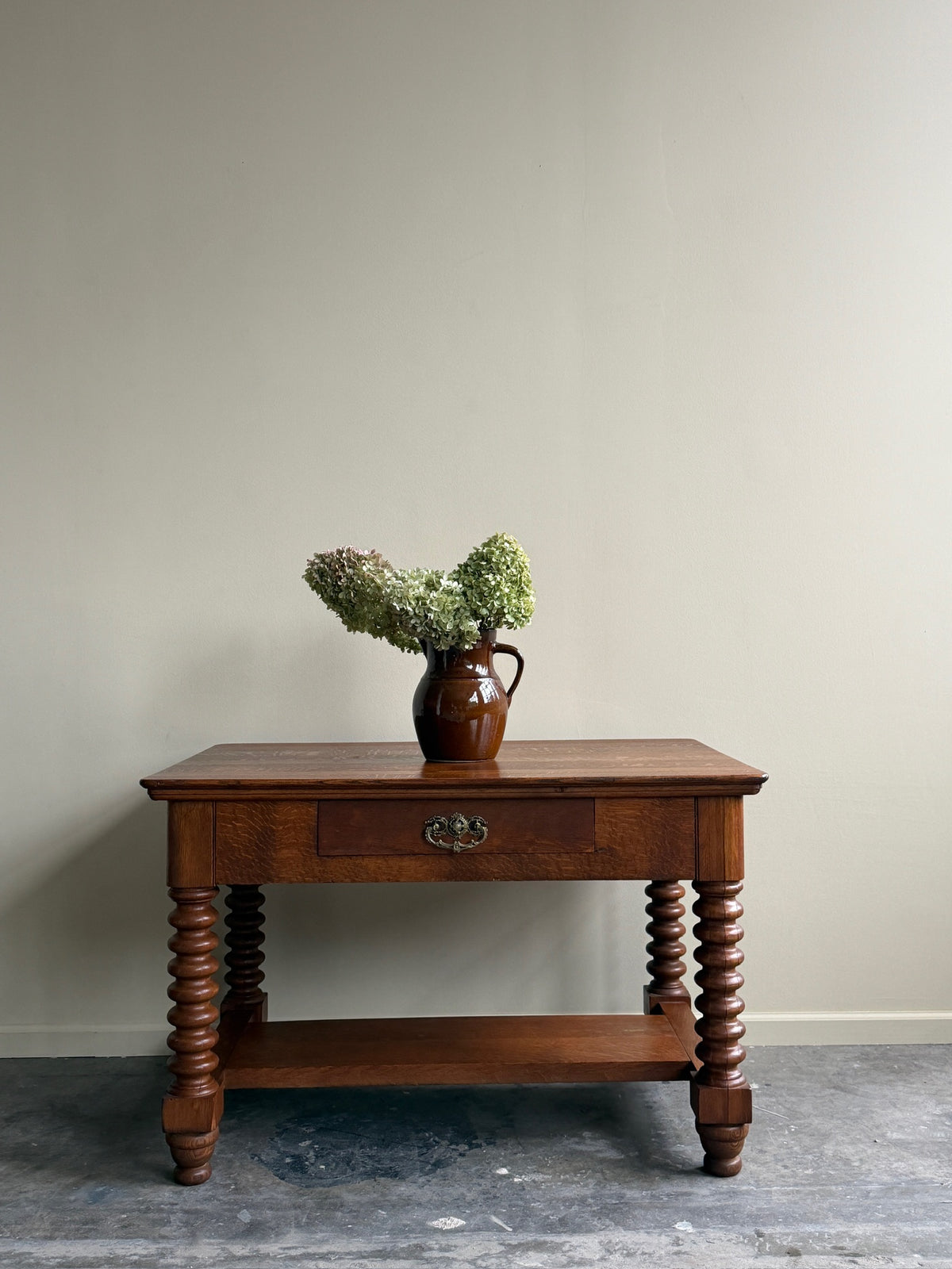 Golden oak spindle leg library table