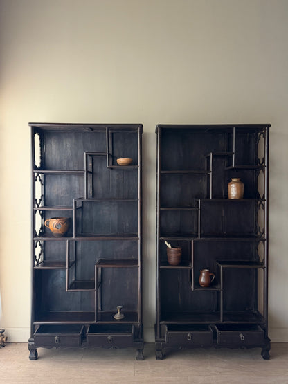 2 carved rosewood etageres. Sold individually.
