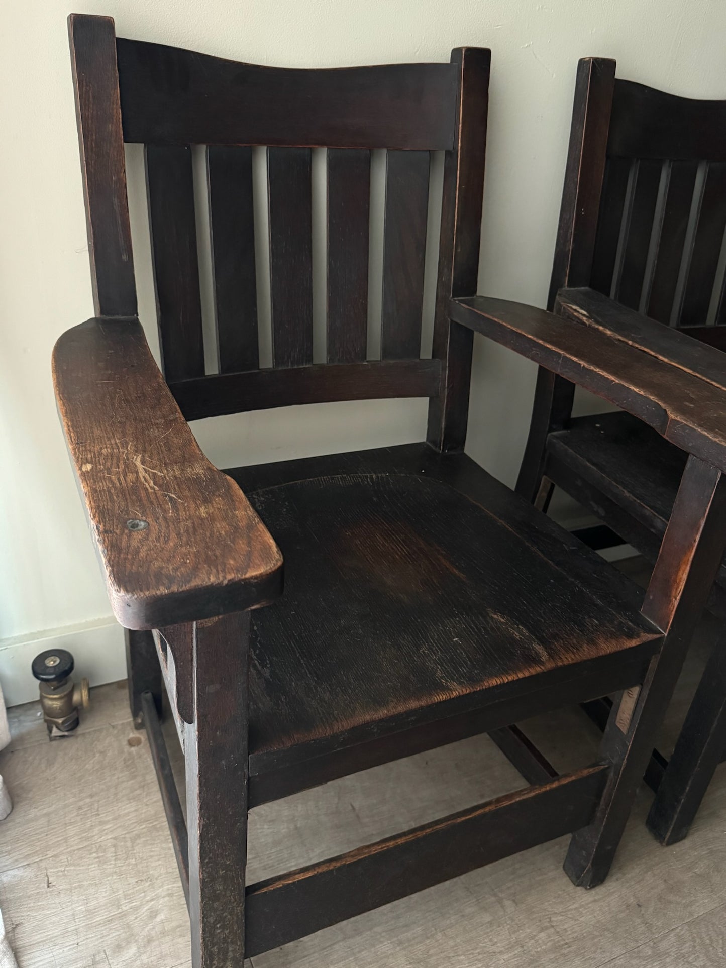 Mission oak arm chairs. Sold individually.