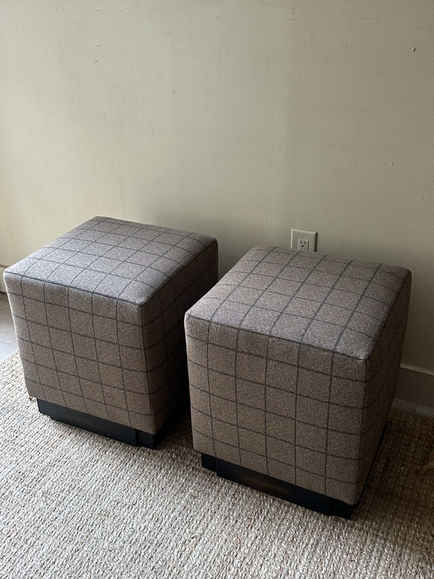 Wool ottomans. Holes in fabric on two sides.