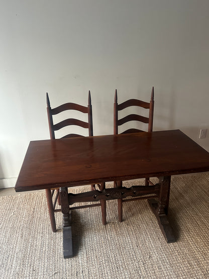 Carved oak trestle table