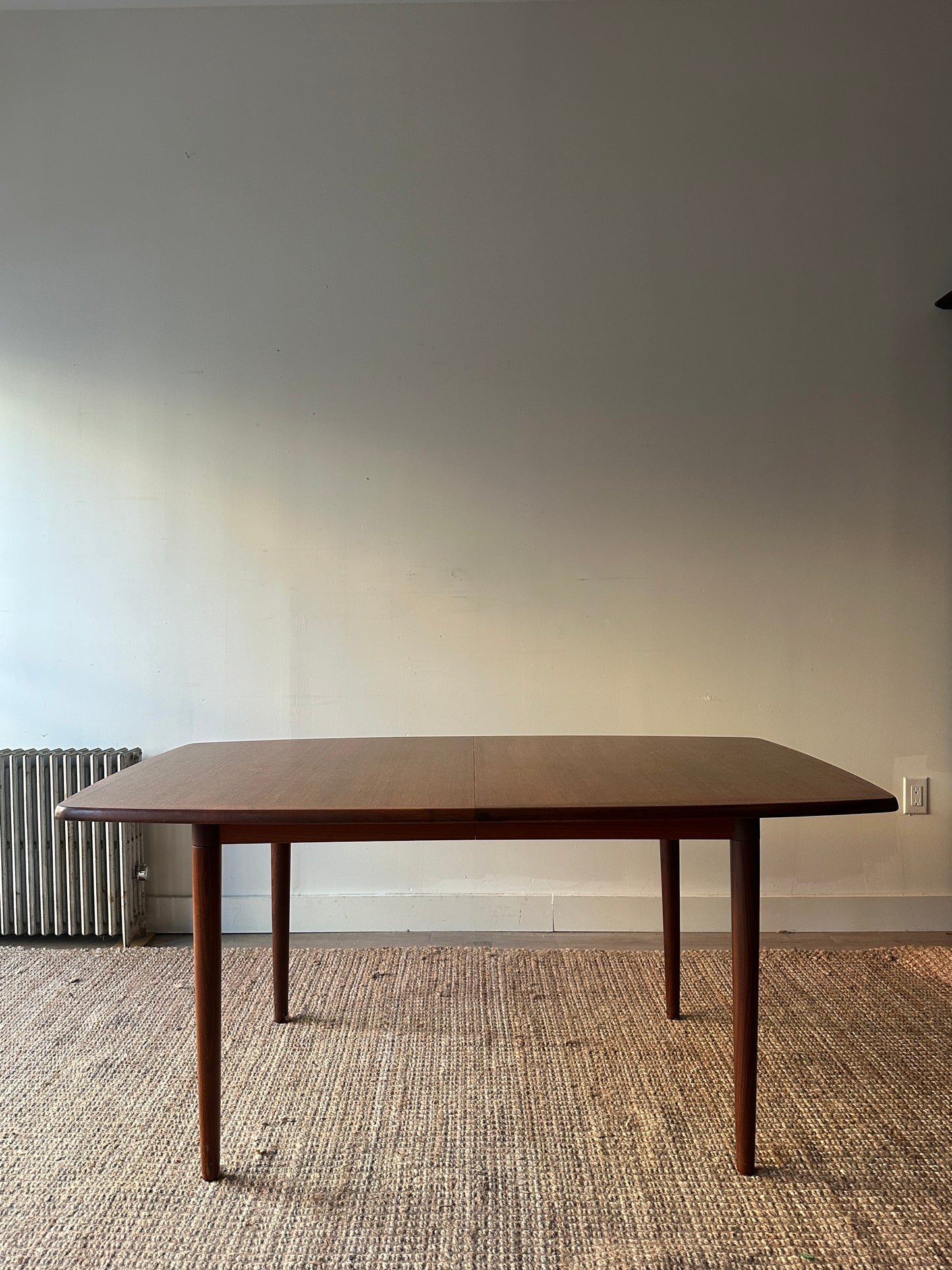 Danish teak dining table with two leaves