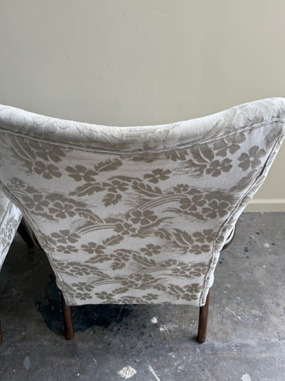 Danish wingback grey floral velvet lounge chairs (left)
