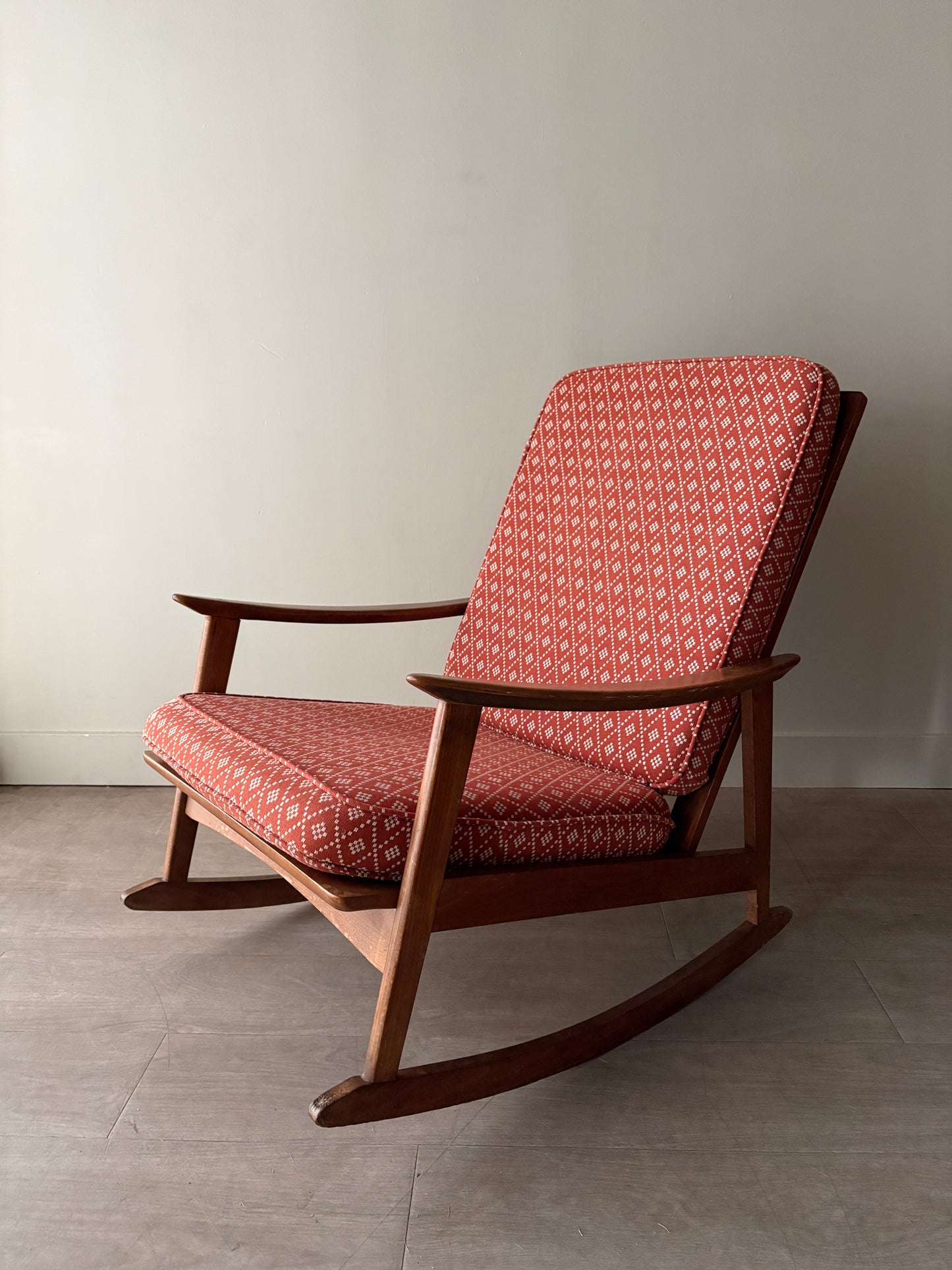Walnut upholstered rocking chair