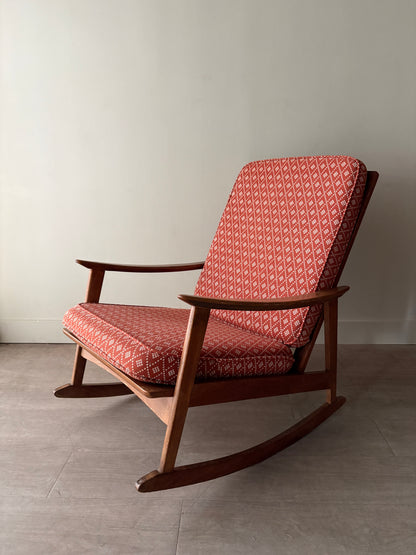 Walnut upholstered rocking chair