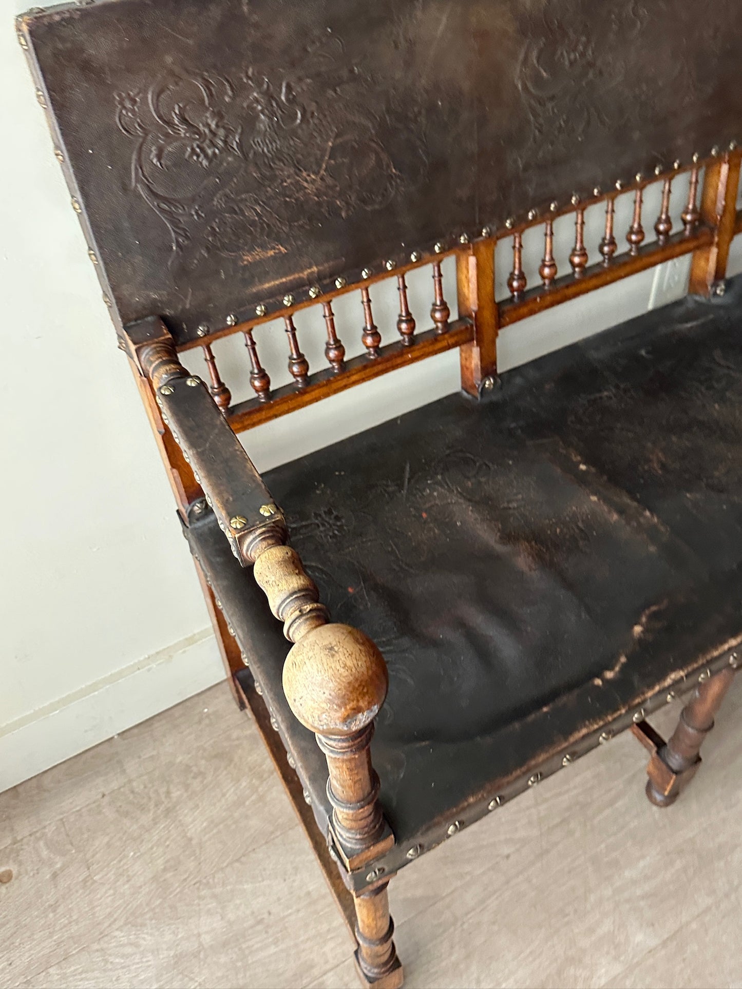 Embossed leather bench