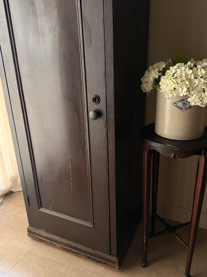 Dark stained chimney cupboard