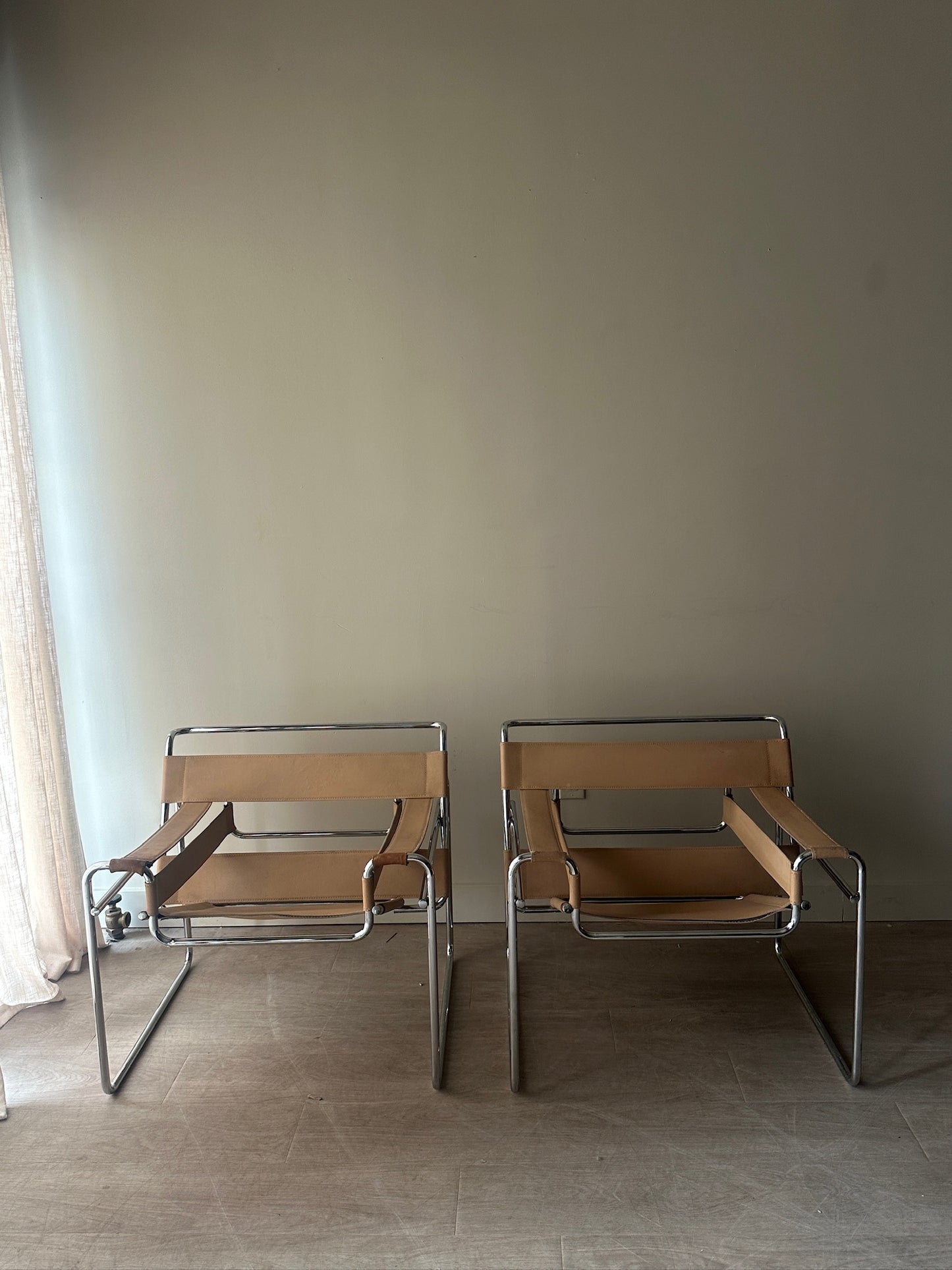 Tan Wassily chairs. Sold individually.