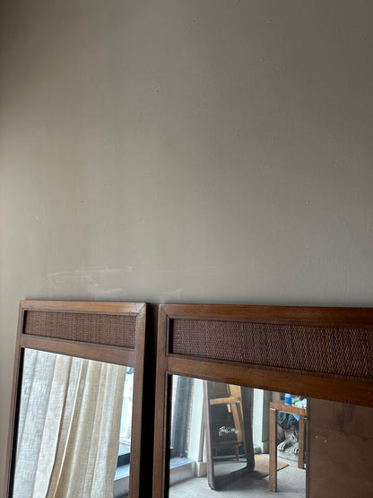 2 walnut and cane mirrors. Sold individually.