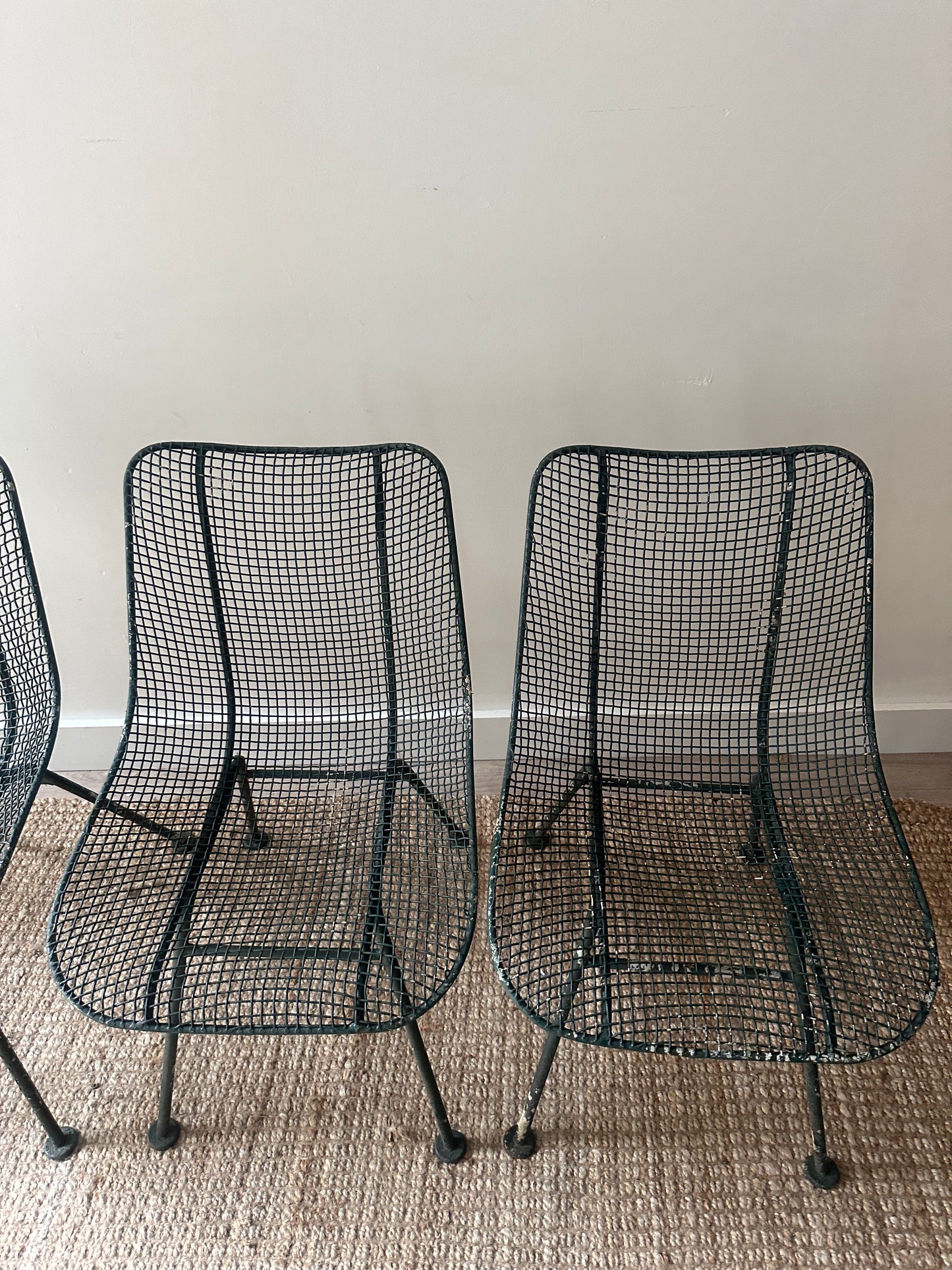 6 Woodard Sculptura chairs. Sold individually.