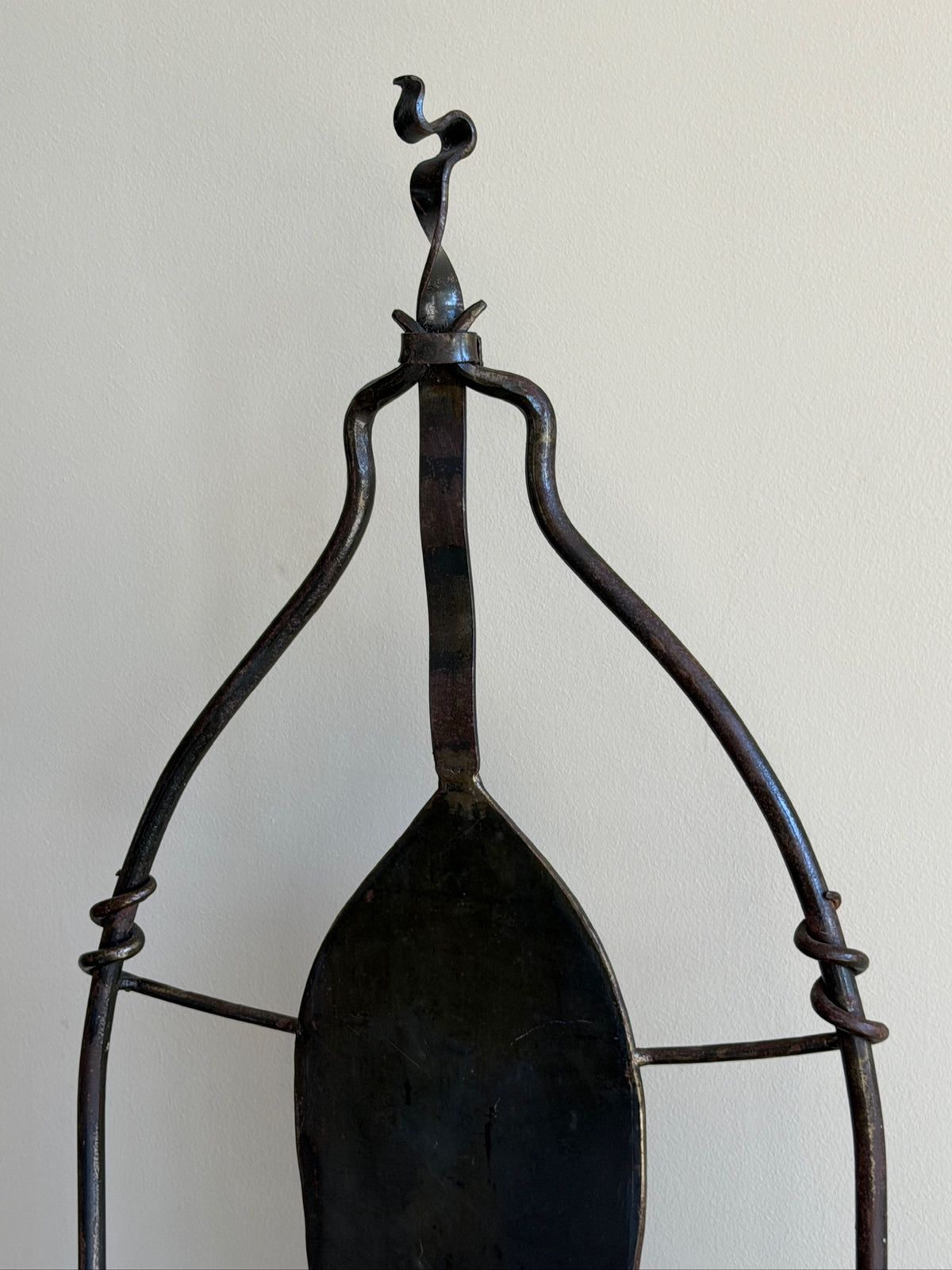 Wrought iron sculptural chairs (left)