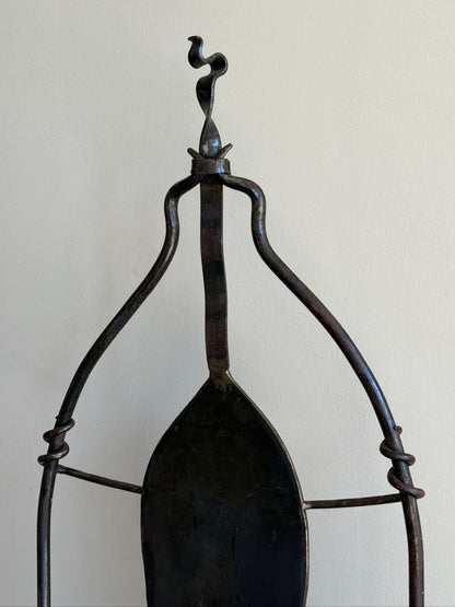 Wrought iron sculptural chairs (left)