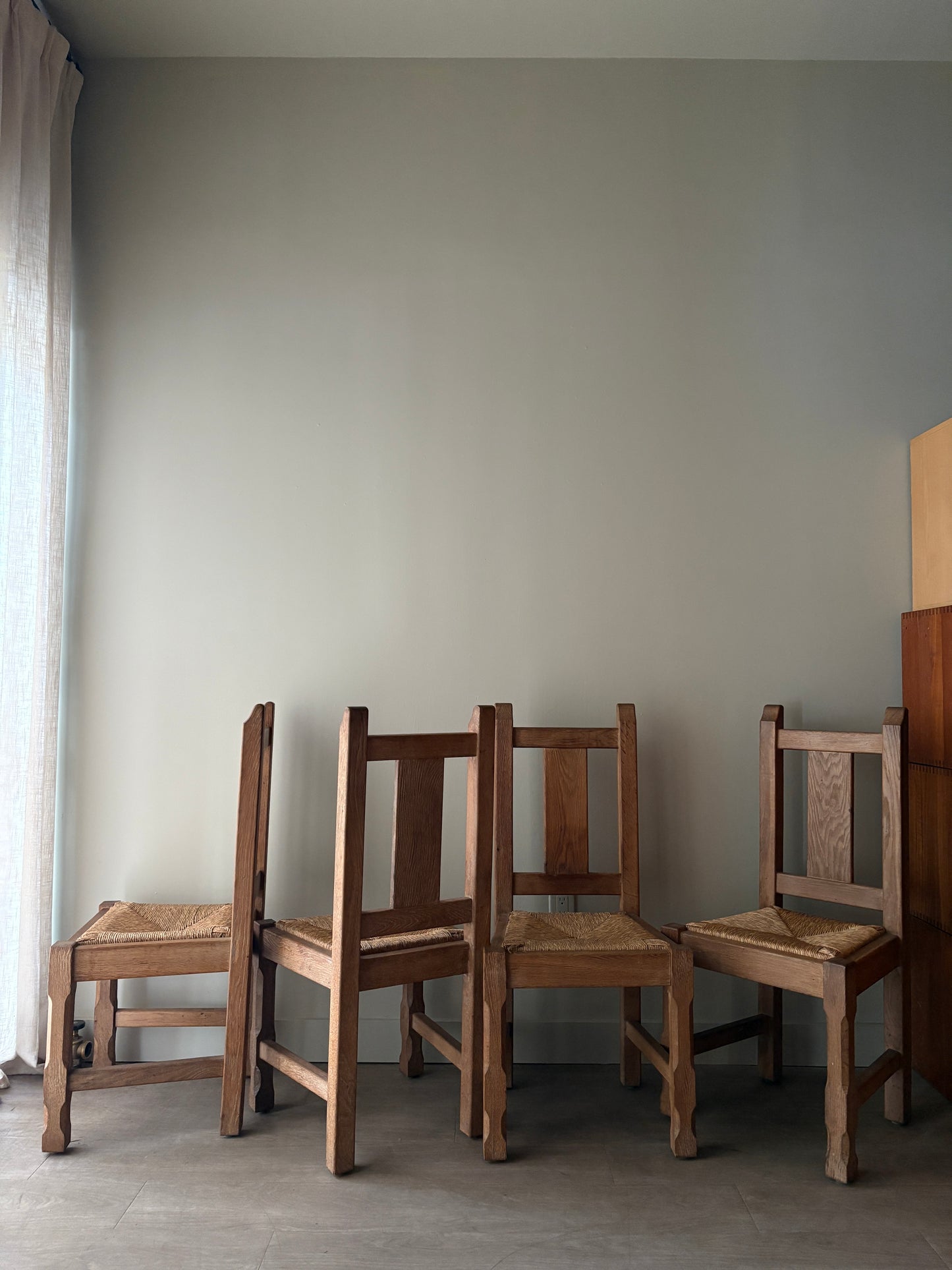 Belgian De Puydt oak & rush dining chairs. Sold in pairs.