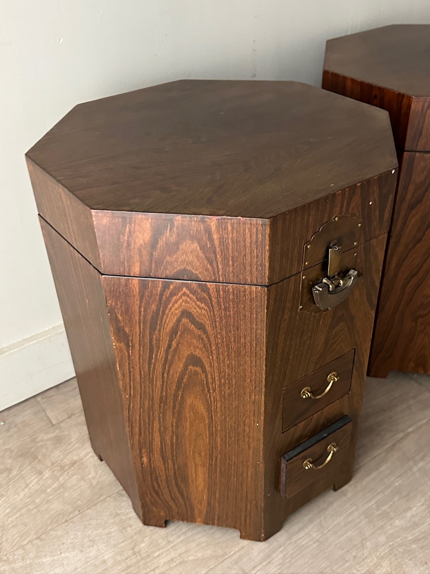 2 octagonal rosewood side tables. Sold individually.