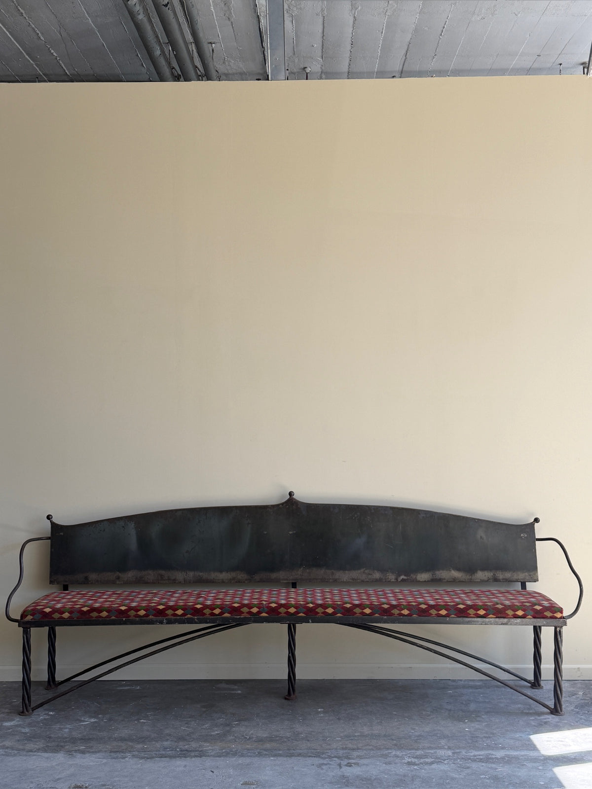 Wrought iron sculptural bench