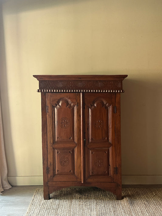 Carved pine cabinet
