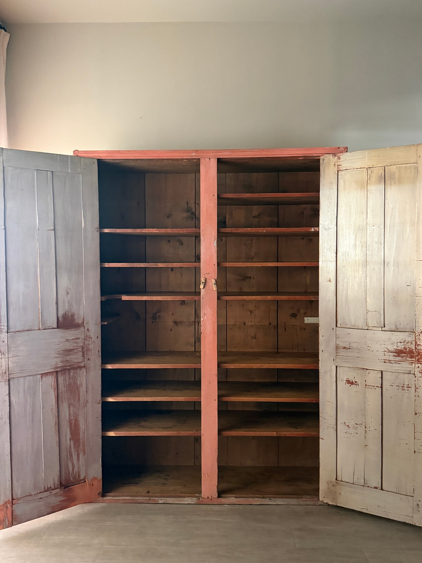 Salmon painted pine cupboard