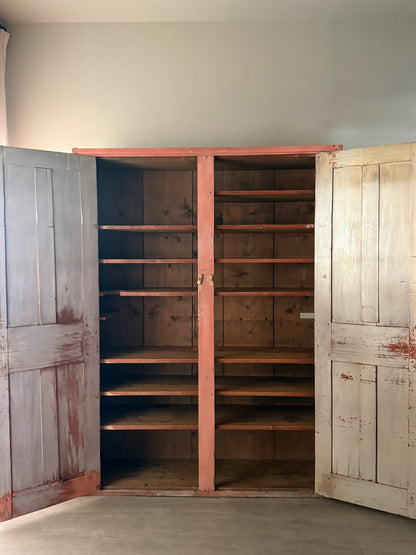 Salmon painted pine cupboard
