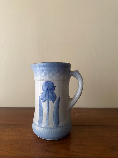 Salt glazed stoneware pitcher with flower