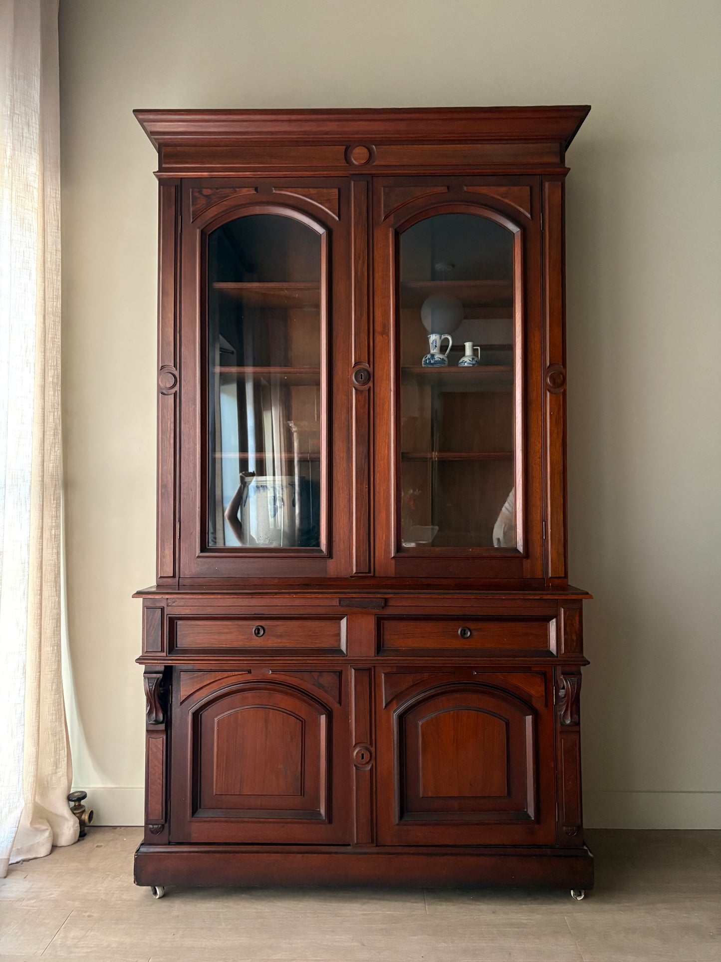 Victorian walnut two piece display hutch with writing slide