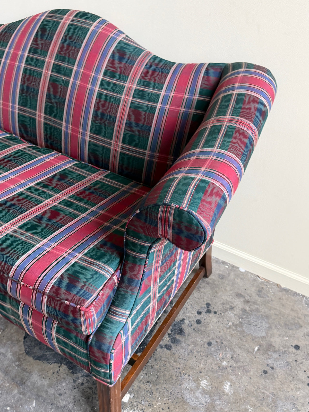 Camelback loveseat in plaid moiré upholstery