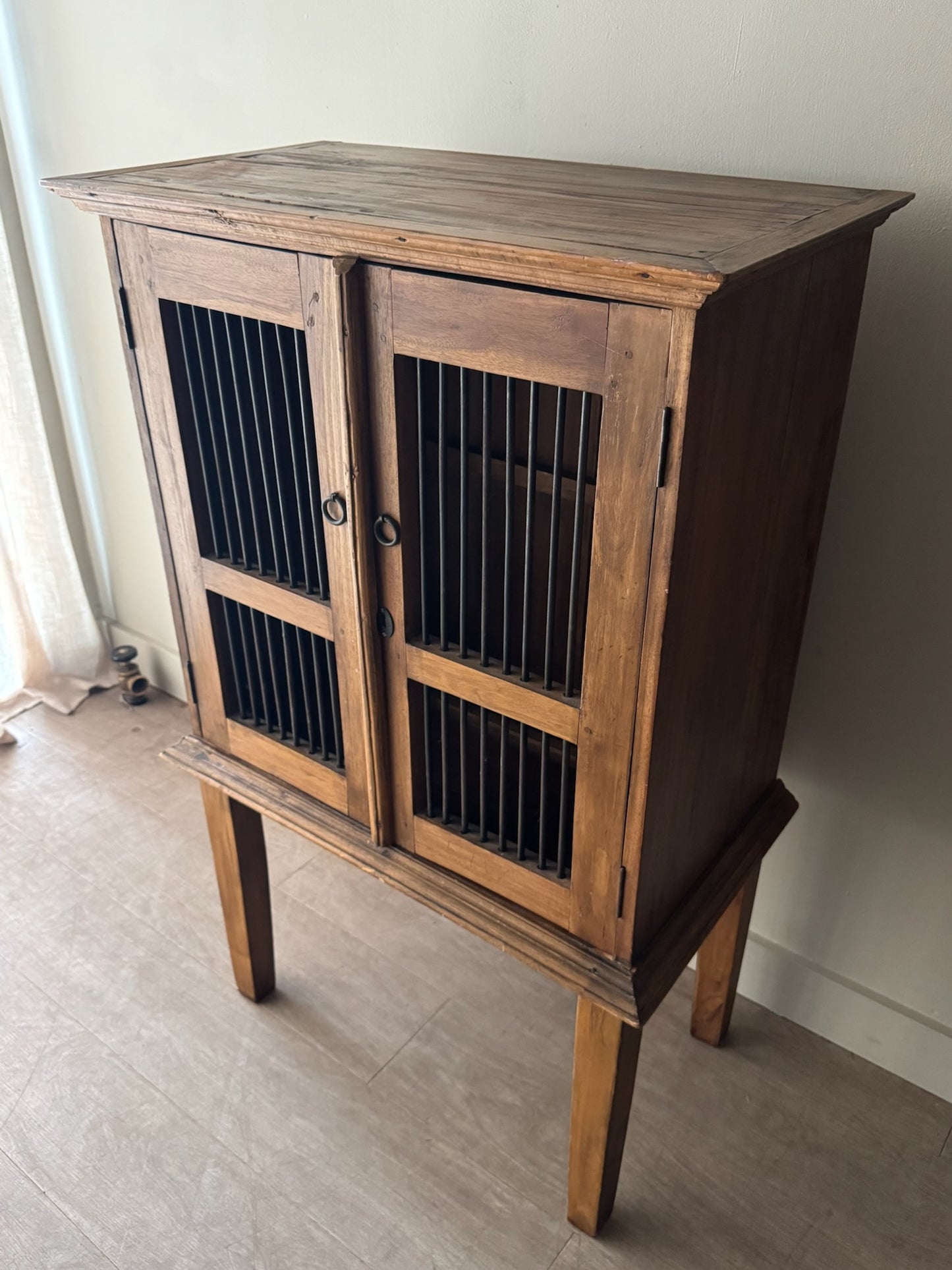 Walnut spindle door cabinet