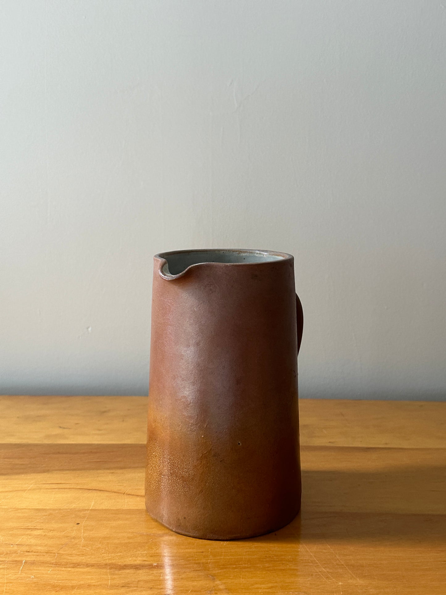 Brown stoneware pitcher