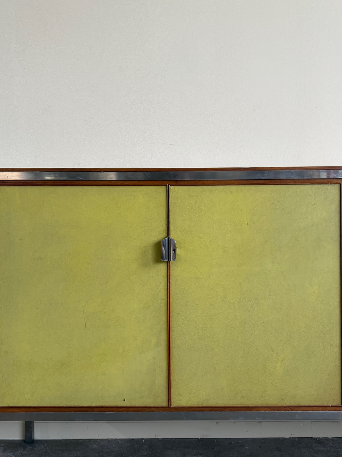 Nichols English bookcase with green vinyl doors