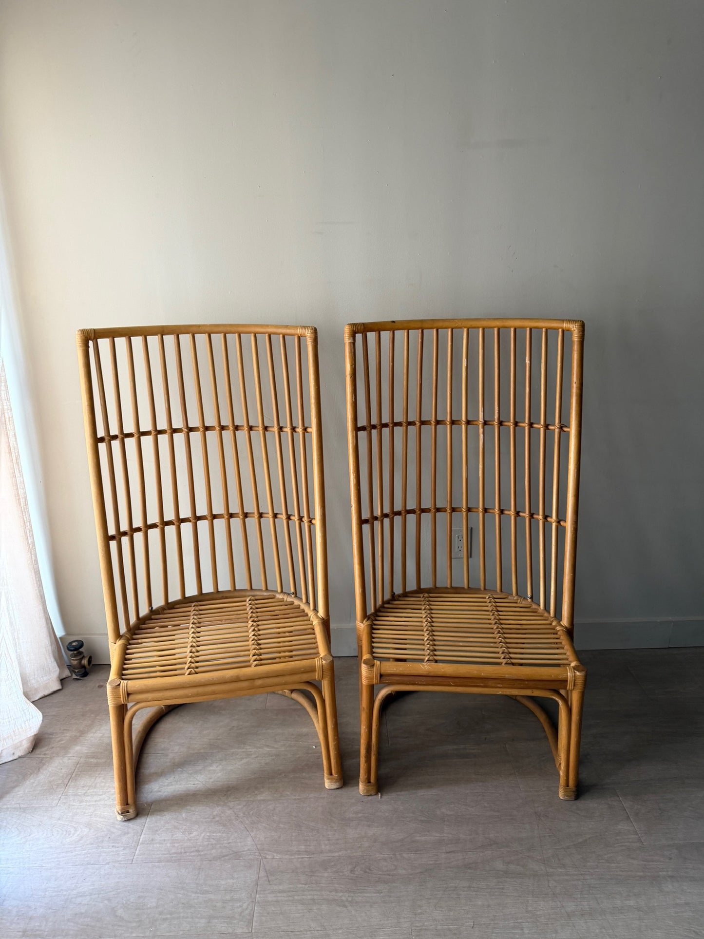 Rattan chairs. Sold individually.