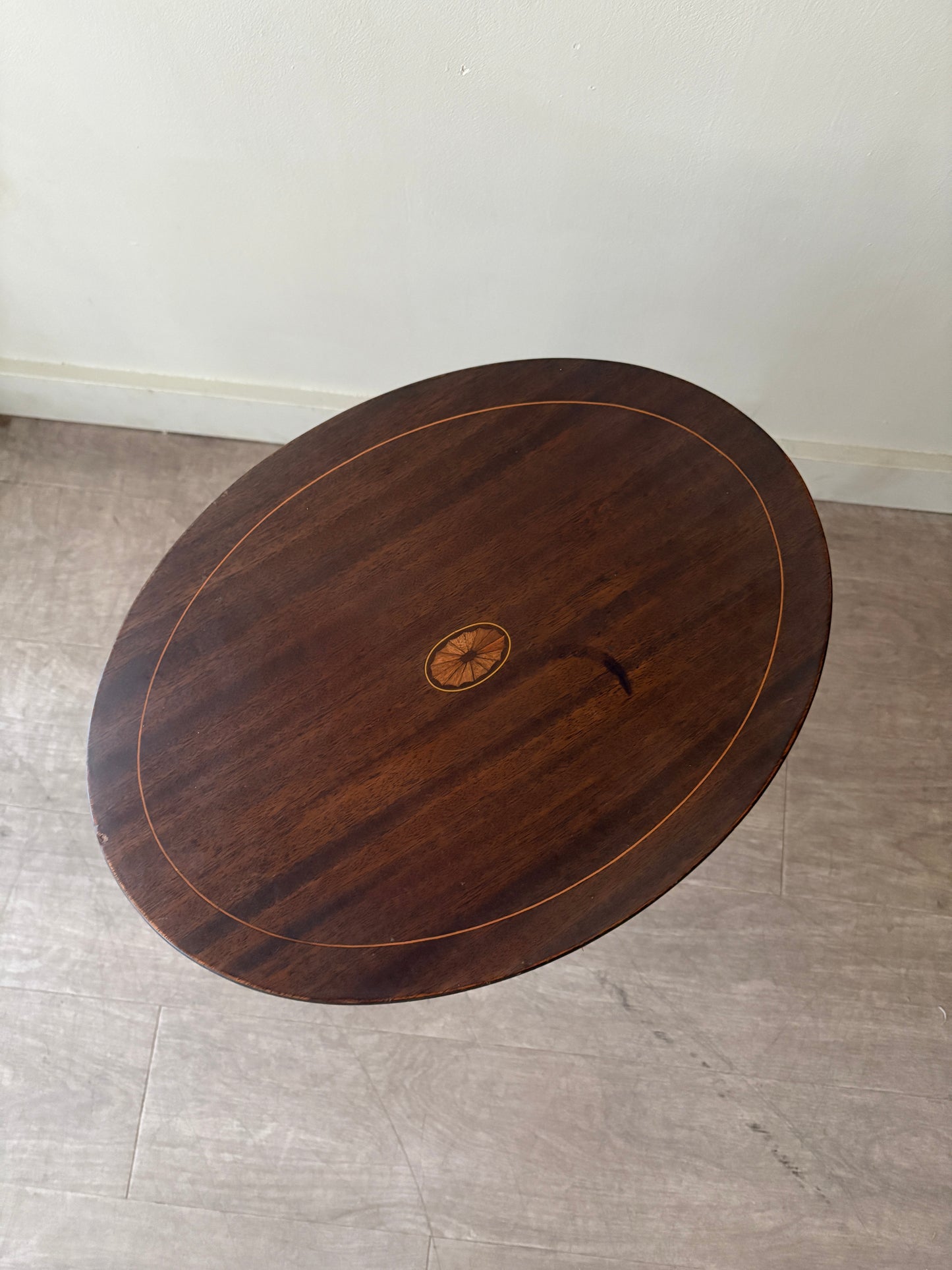 Inlaid mahogany tilt top side table