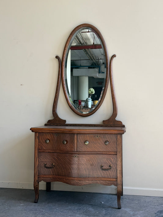 Golden oak dresser with mirror