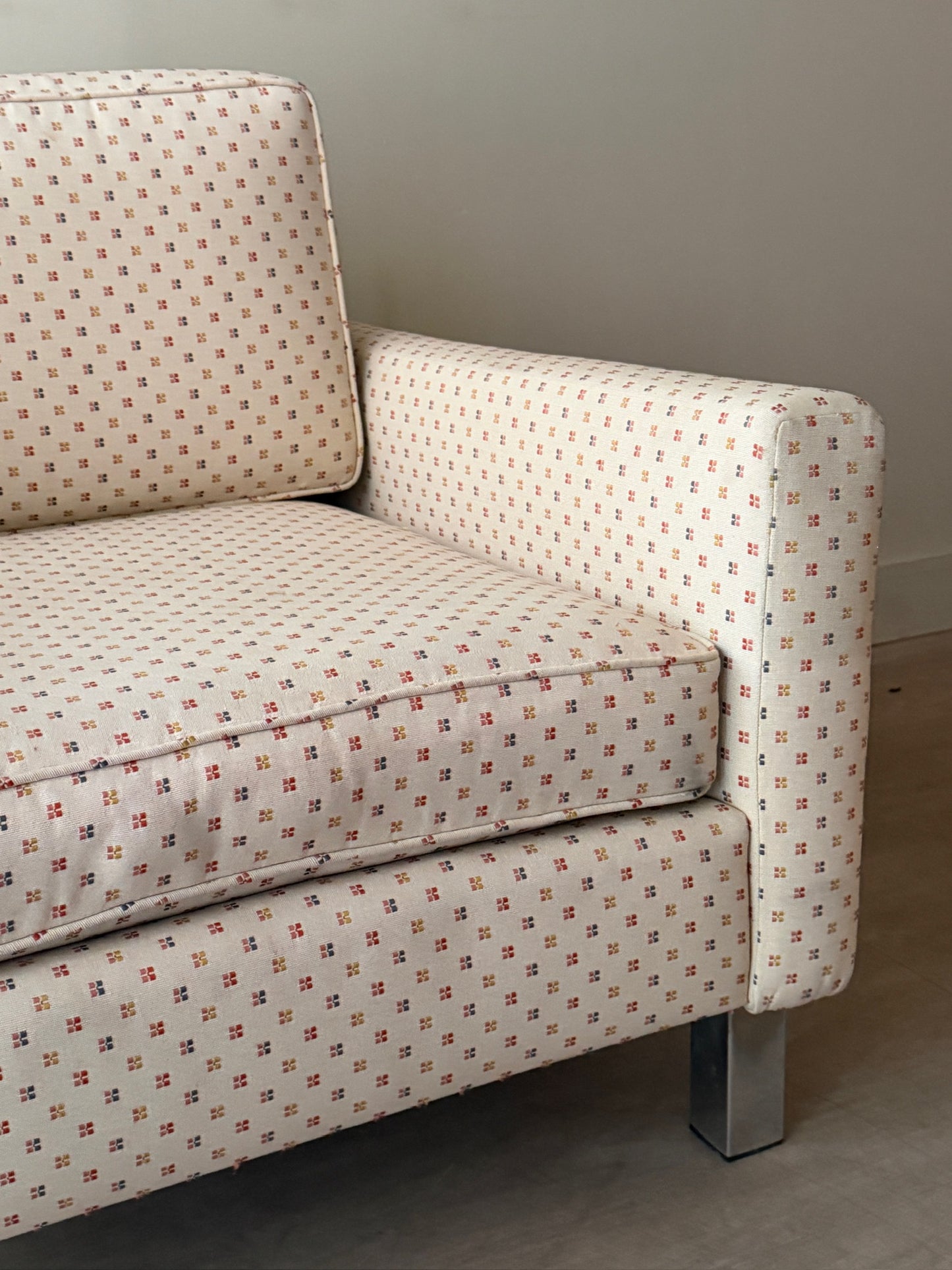 Upholstered chrome armchair