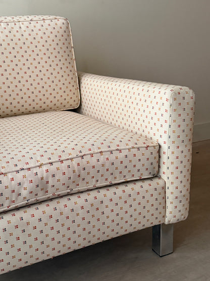 Upholstered chrome armchair