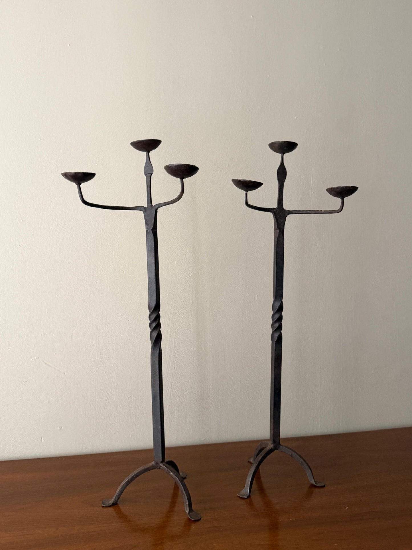 Pair of wrought iron candelabras