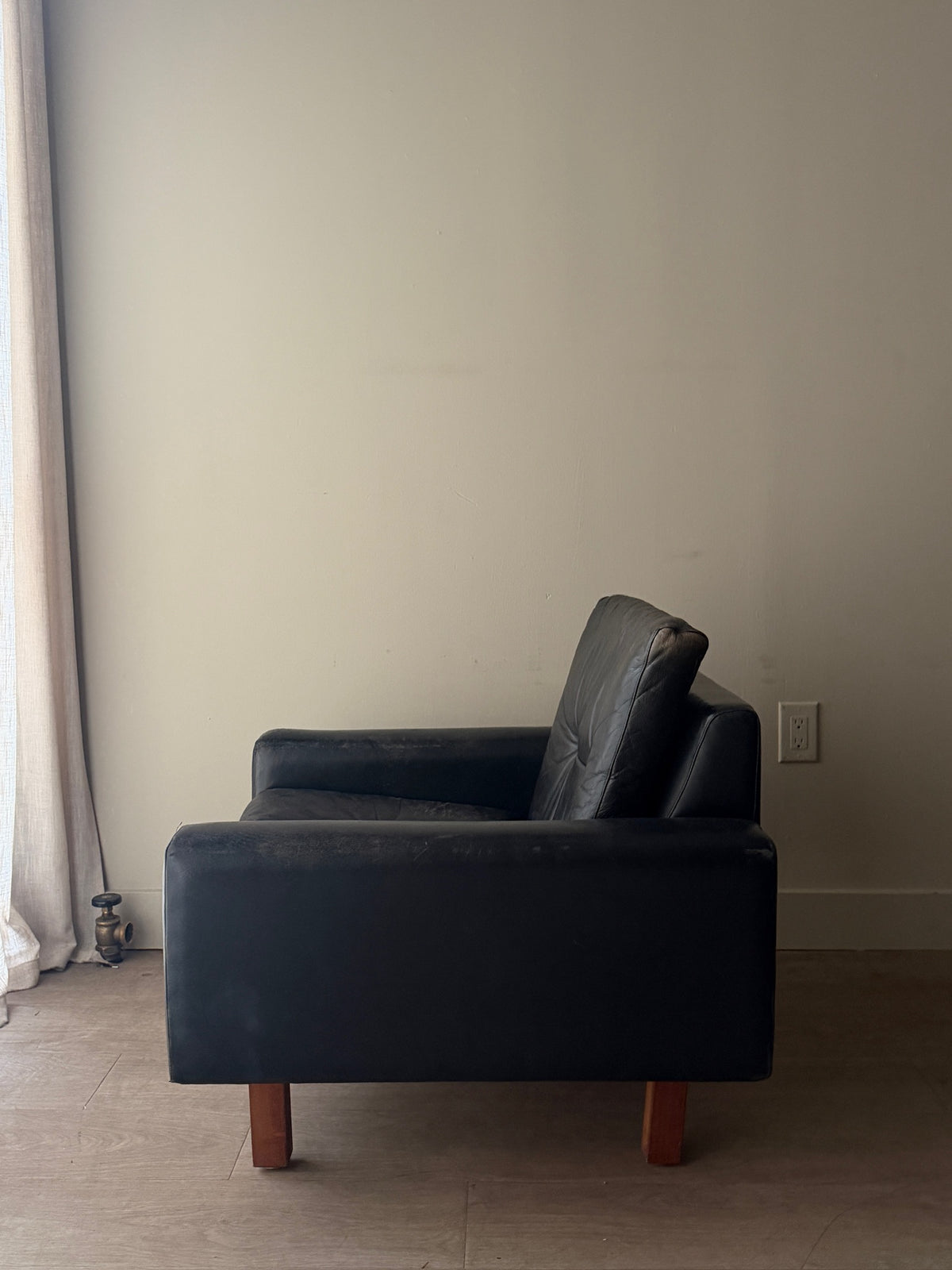 Danish black leather lounge chair