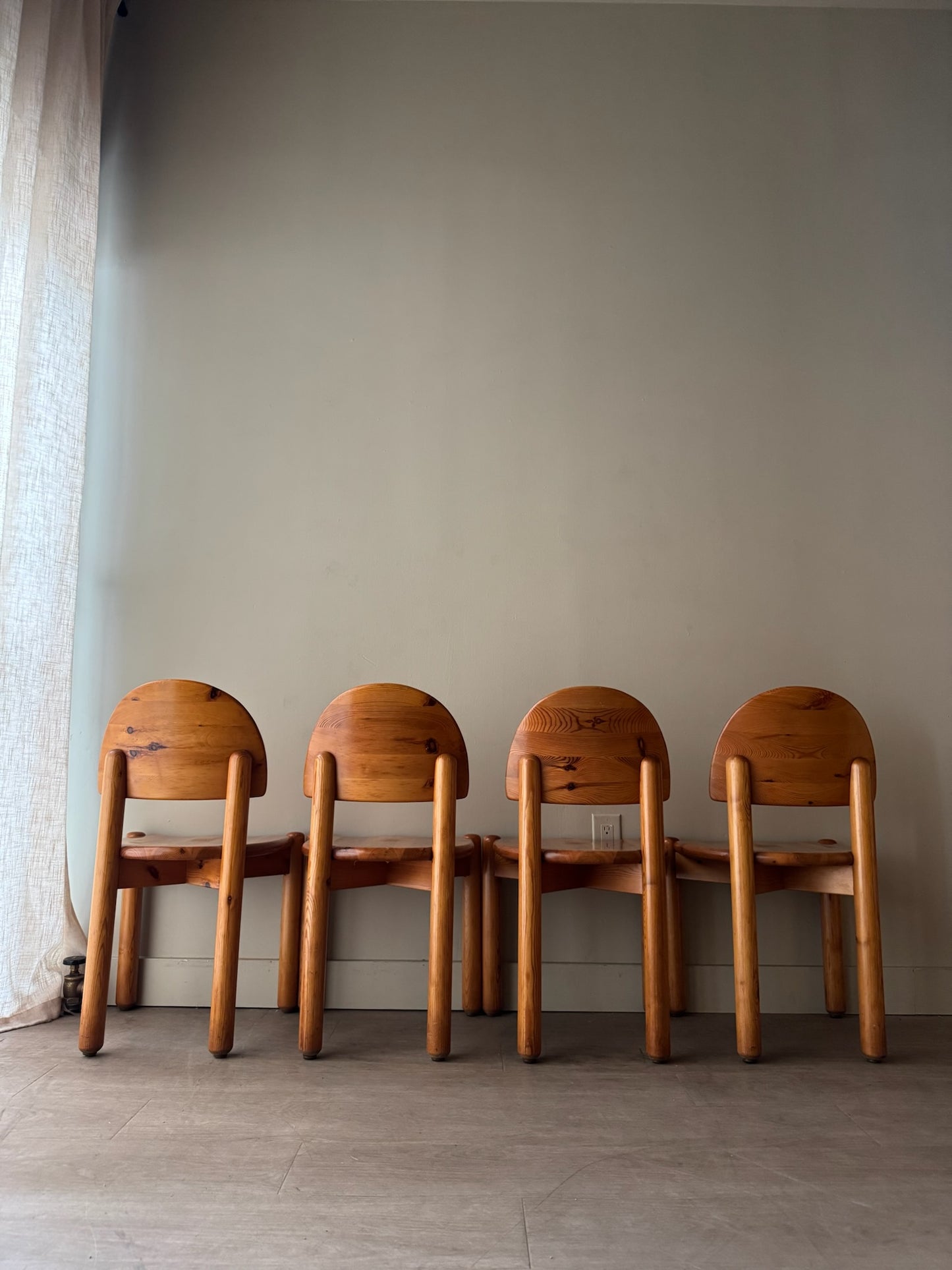 Rainer Daumiller pine dining chairs with satin finish. Sold as a set of 4.