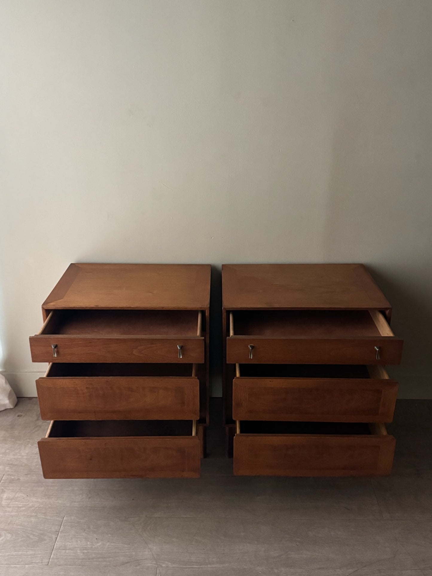 Walnut nightstands. Sold as a pair.