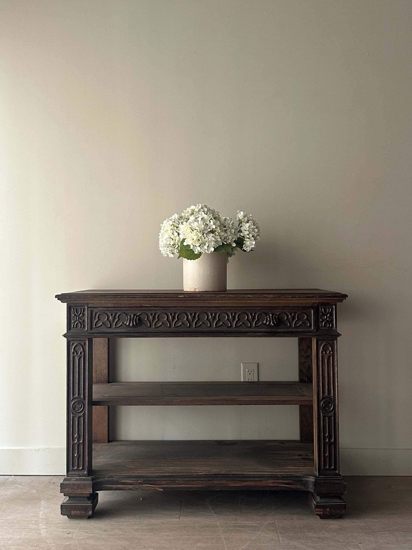 Carved console table