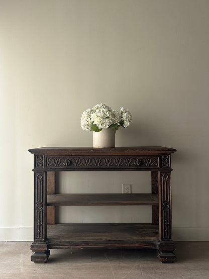 Carved console table