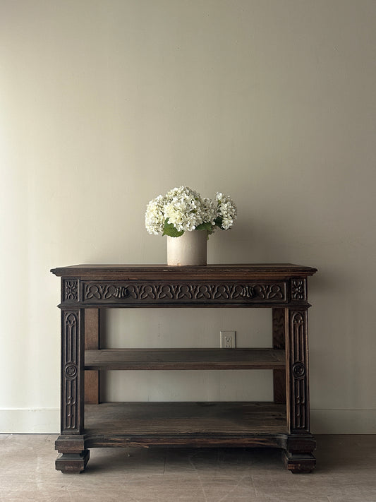 Carved console table