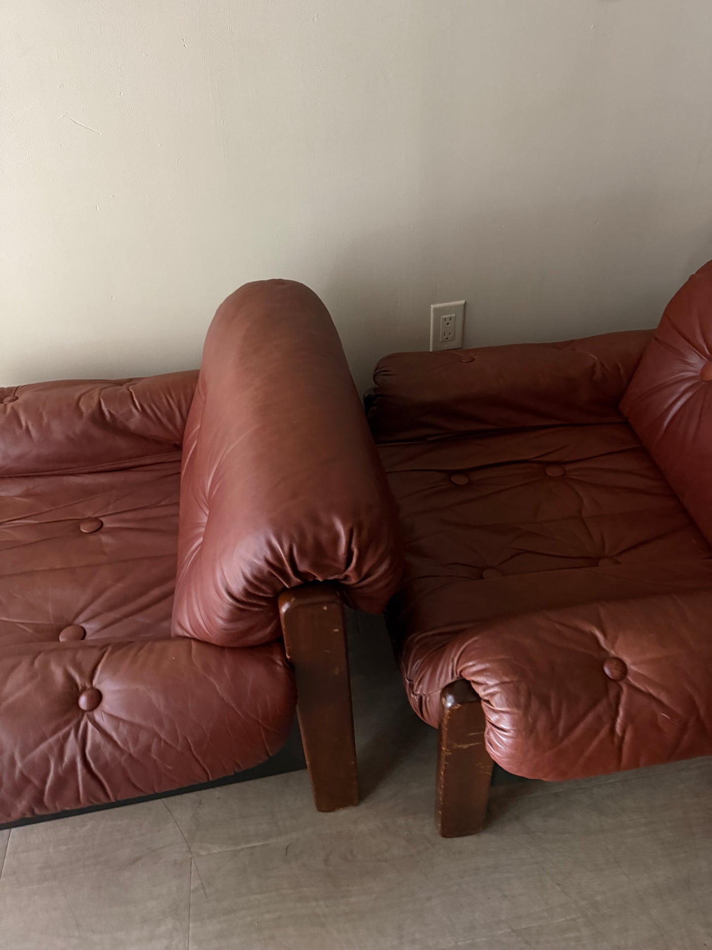 Swedish Brutalist brown leather lounge chairs. Sold individually.