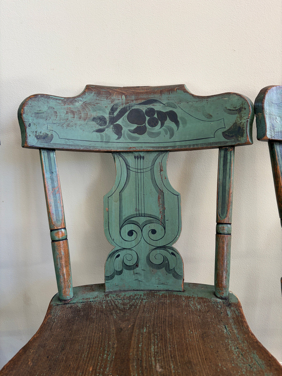 Pennsylvania Sheraton Paint-Decorated Plank Seat Chairs. Sold in pairs.