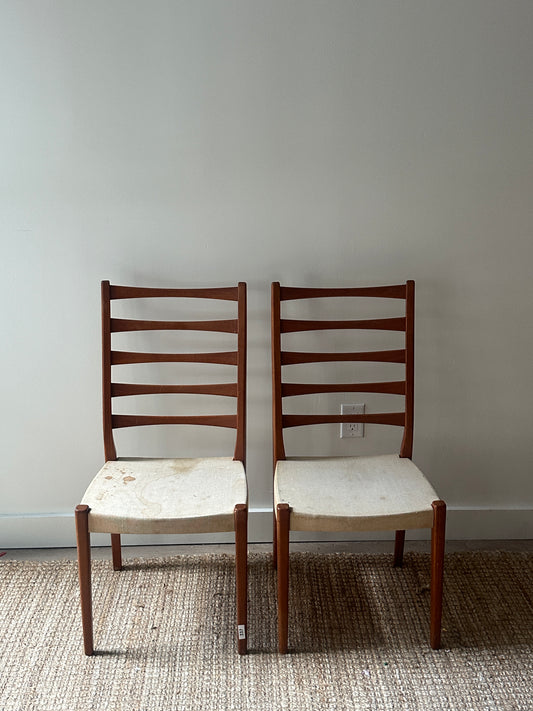 Pair of teak dining chairs