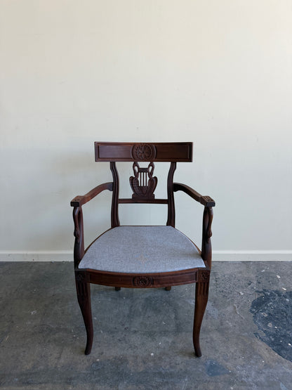 Carved mixed wood armchair