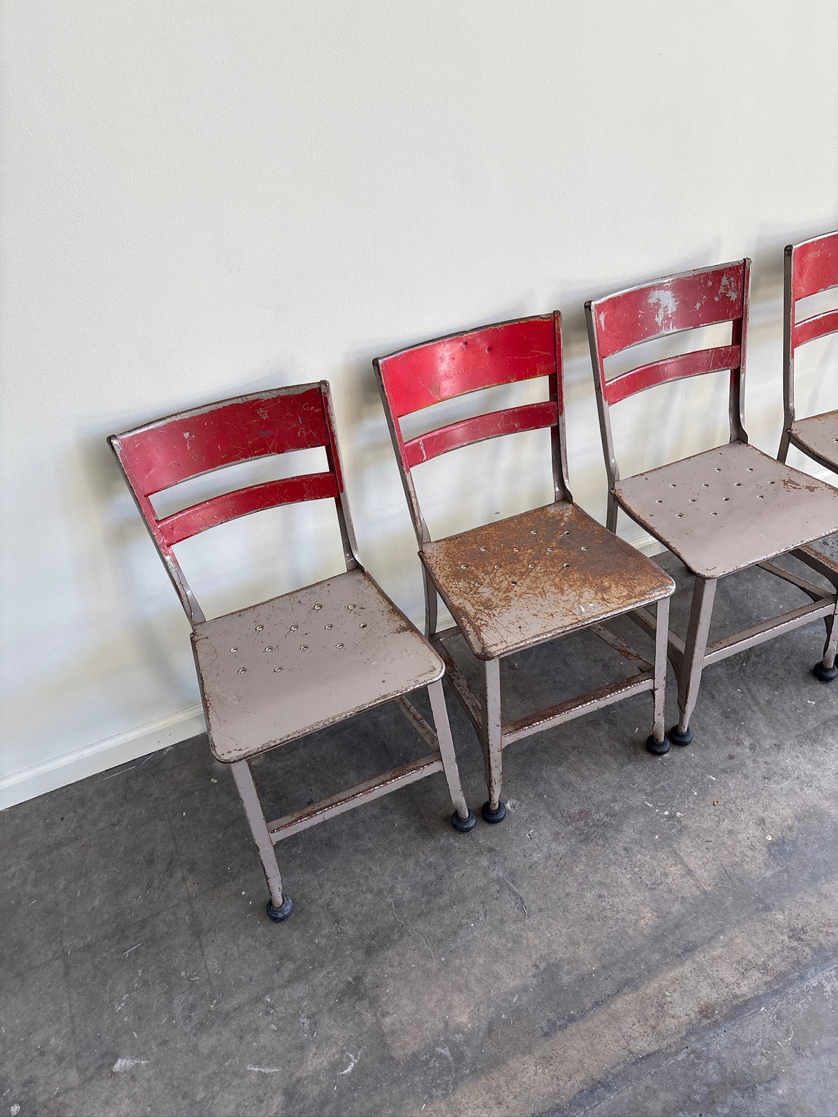 Industrial Toledo steel chairs. Sold in pairs.