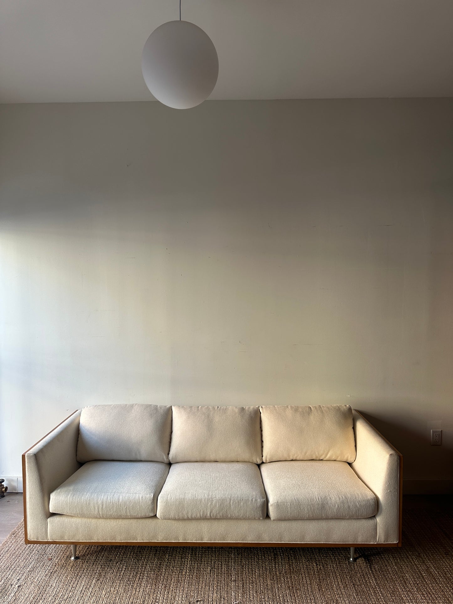 Maurice Villency sofa with wood panels