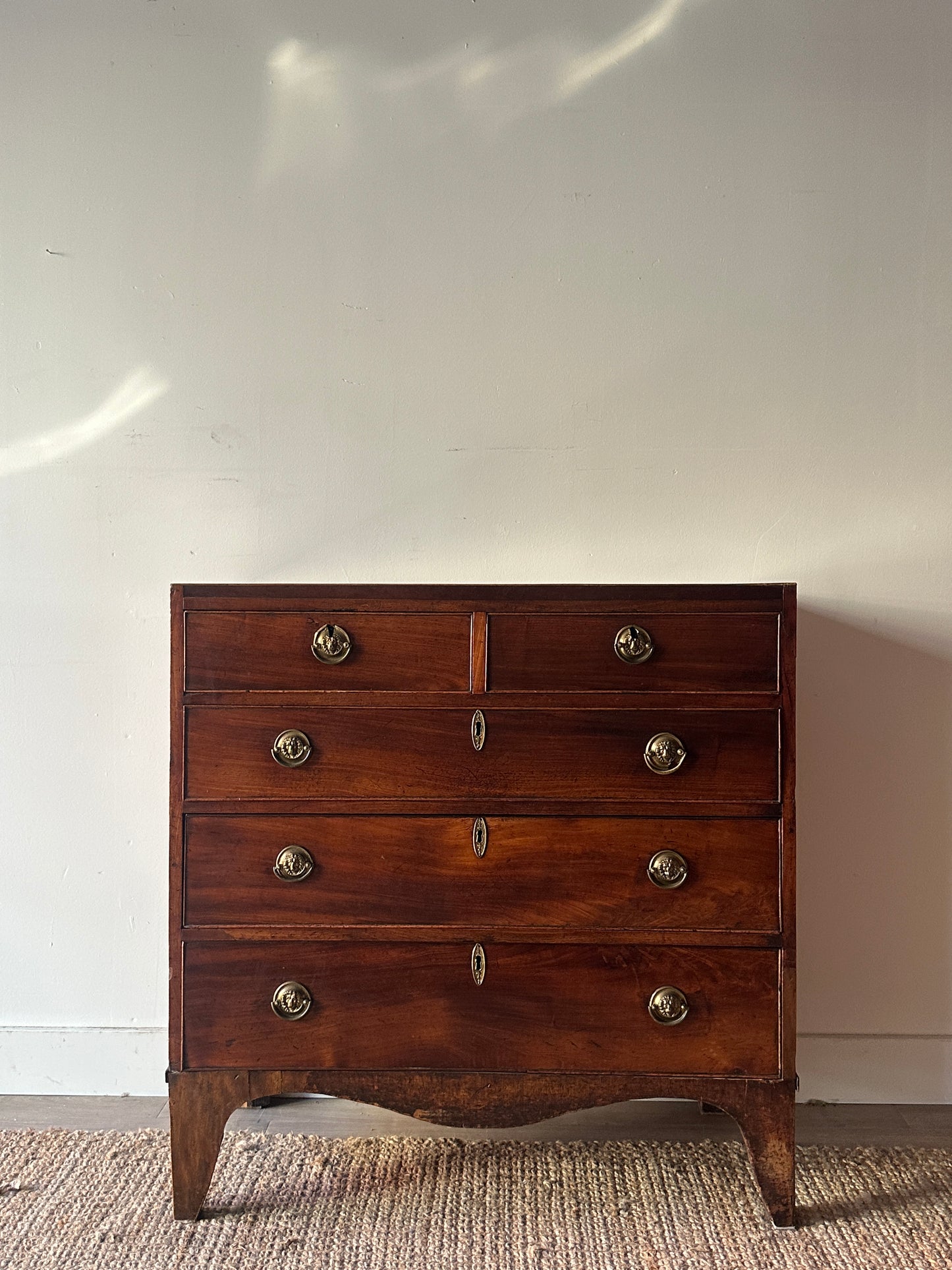 Mahogany bachelors dresser with lion head hardware